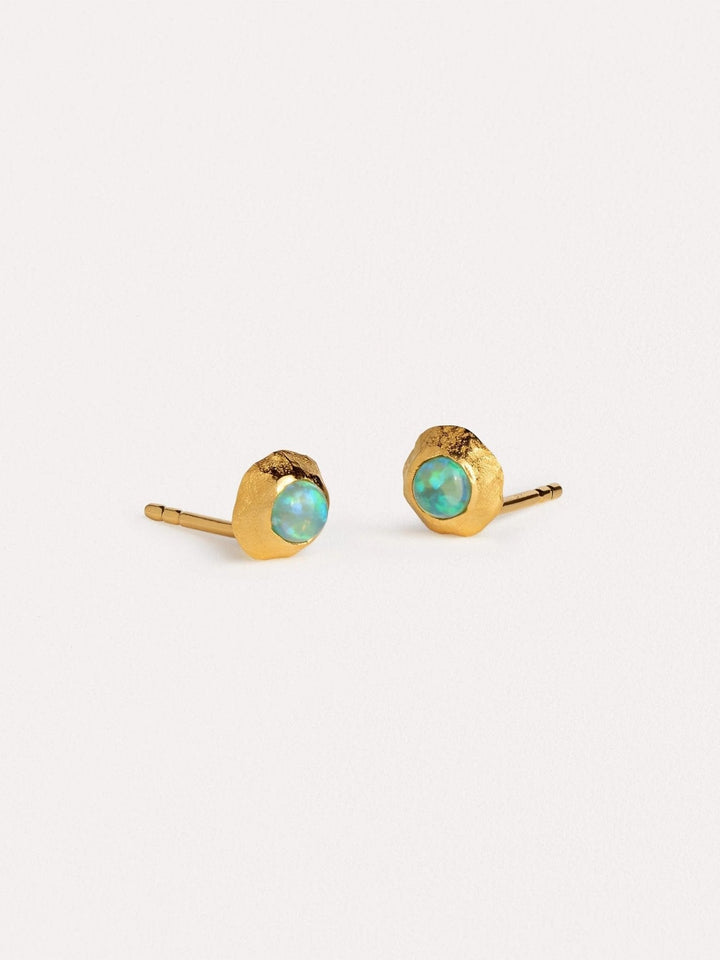 Elegant gold and gemstone earrings with a modern, timeless design.