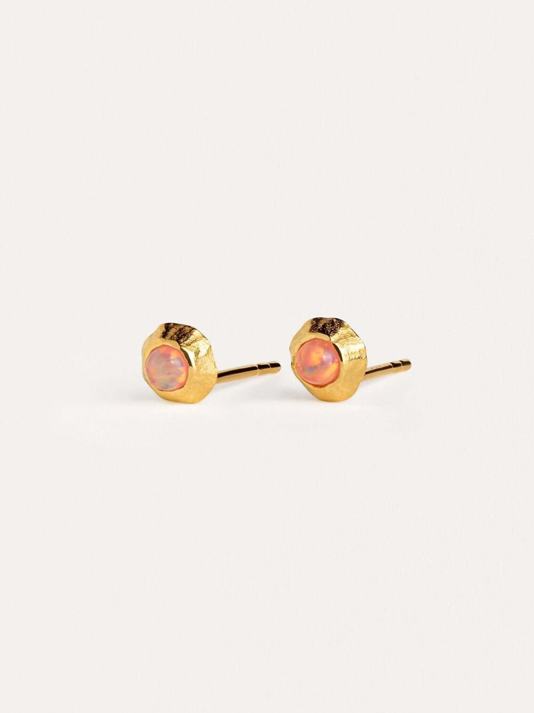 Elegant gold and gemstone earrings with a modern, timeless design.