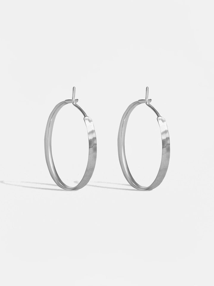 925 sterling silver matte hammered hoop earring – handmade and sustainable design.