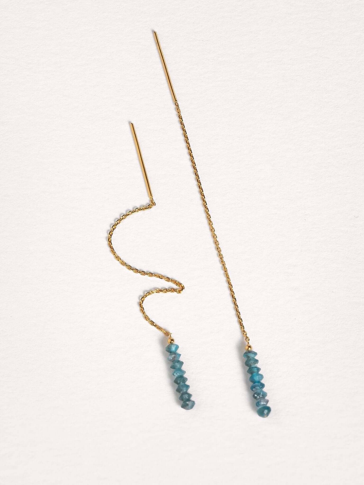 Flexible gold chain threader earrings with apatite gemstones, showcasing lightweight movement.