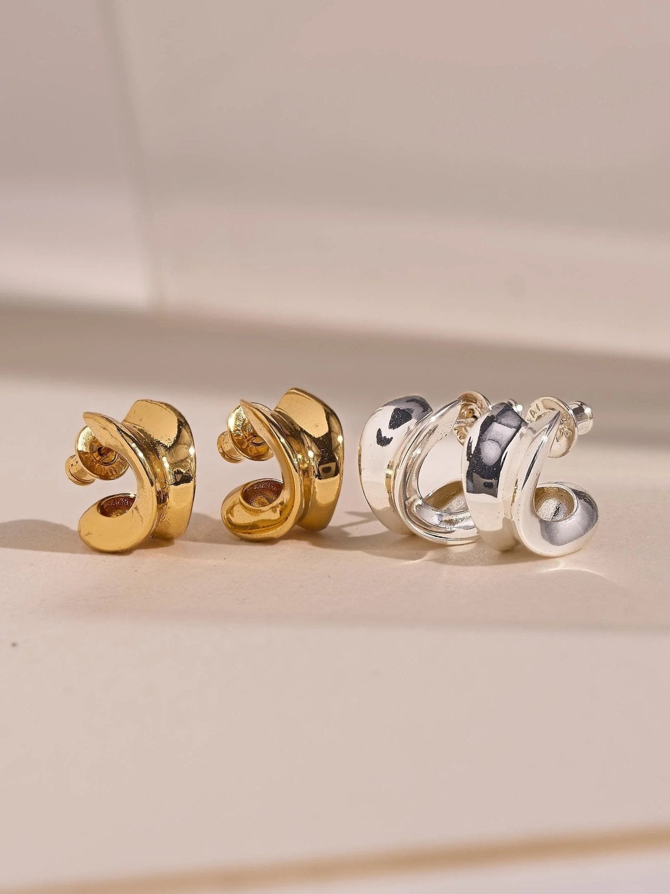 Petite chunky hoops in gold and silver finishes displayed together for color comparison.