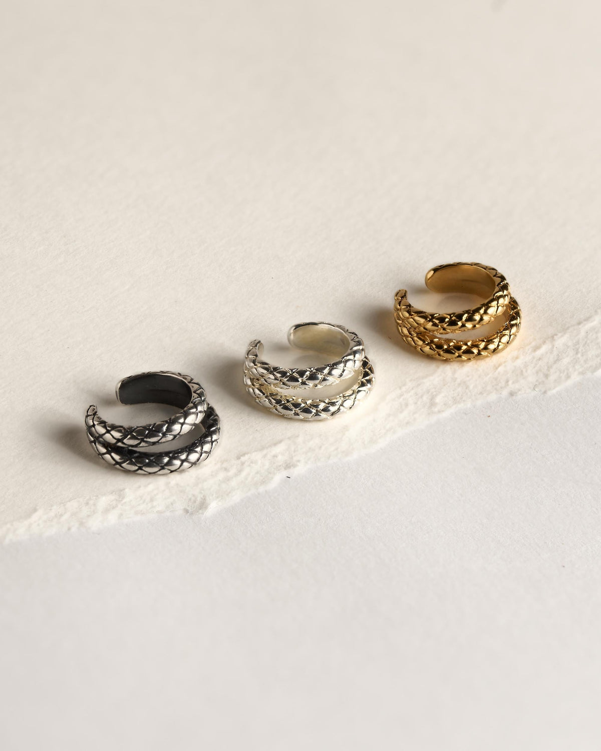 Snake ear cuff in three finishes: oxidized silver, silver plated and 24K gold plated