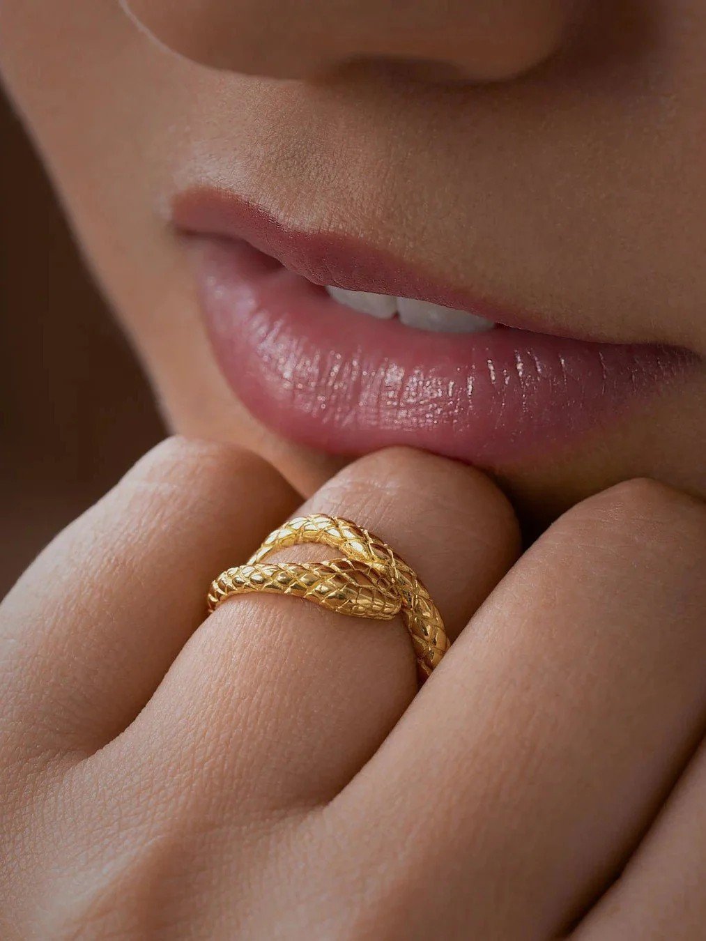 Elegant silver serpent ring featuring intricate details and a moonlit oxidized surface, representing quiet strength and mystic minimalism