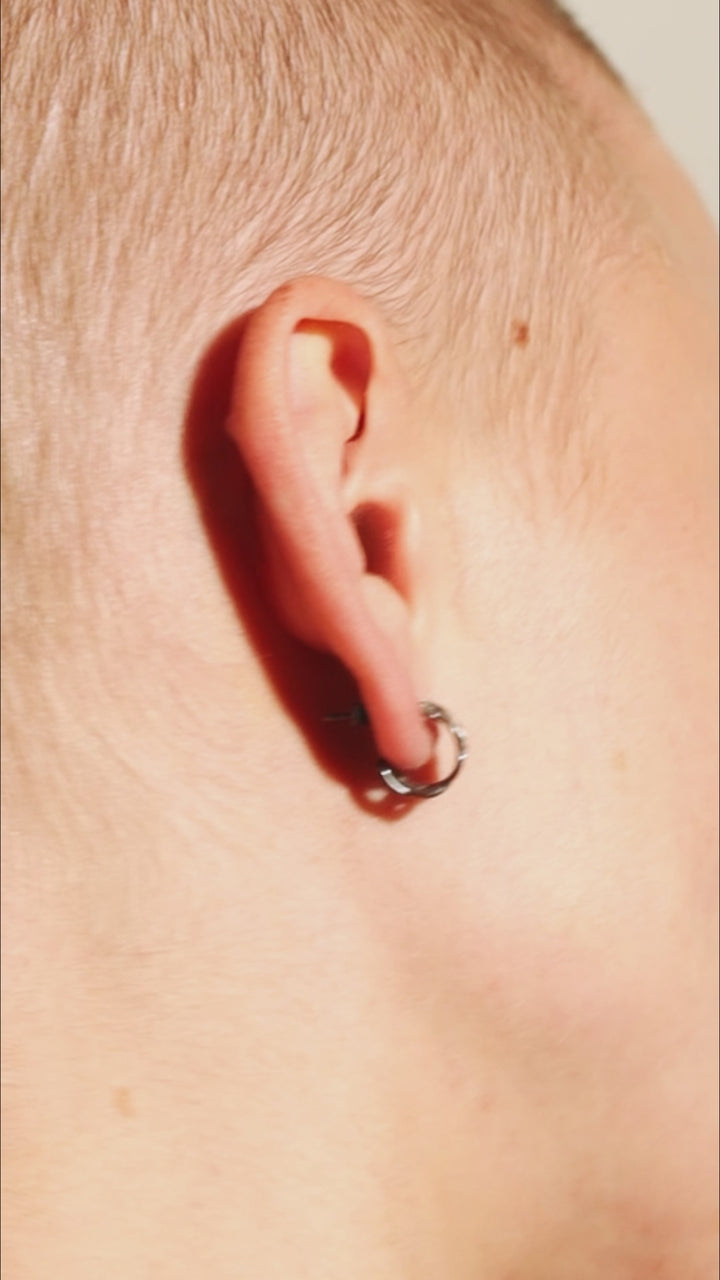 Video of Renatte ear cuff in oxidized silver — close-up movement and fit.