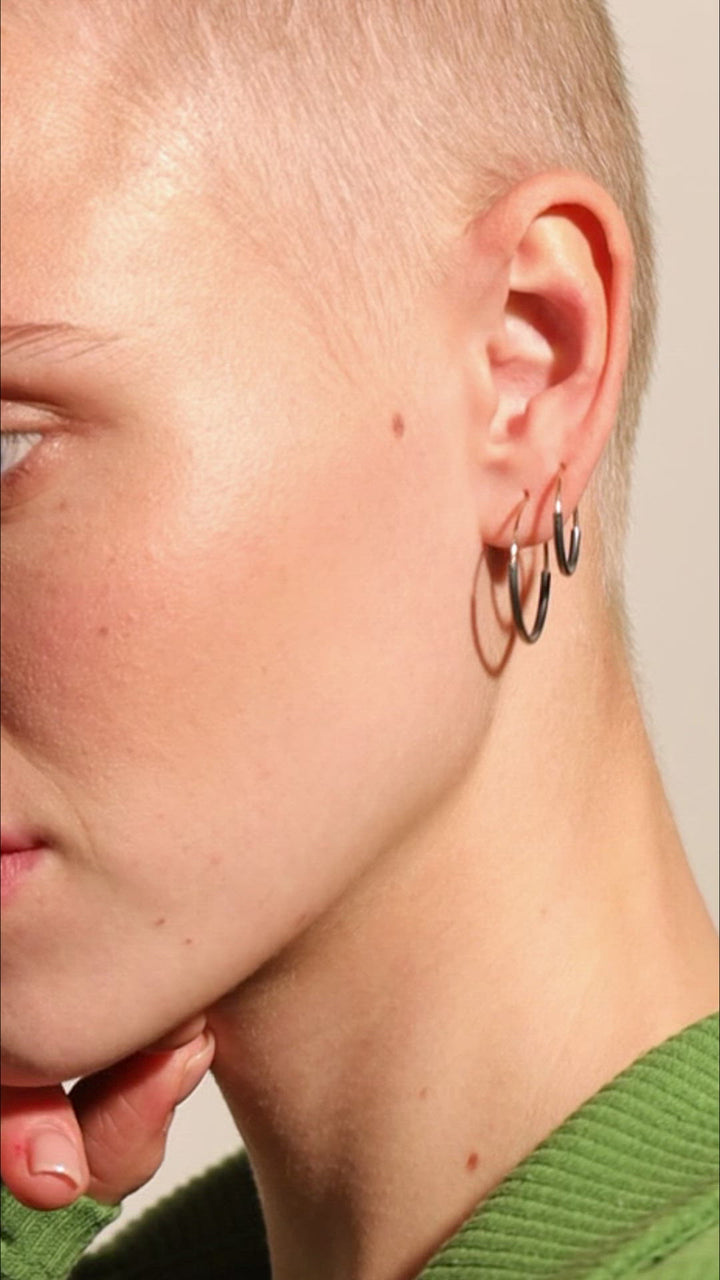 Video of Kim hoop earrings worn — graceful movement and lightweight design in motion.