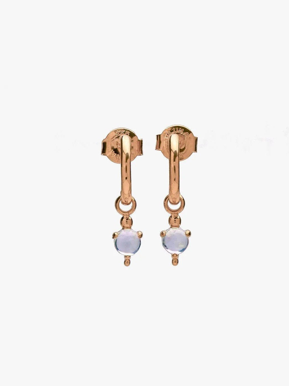 Rose gold hoop earrings with moonstone charm, side angle
