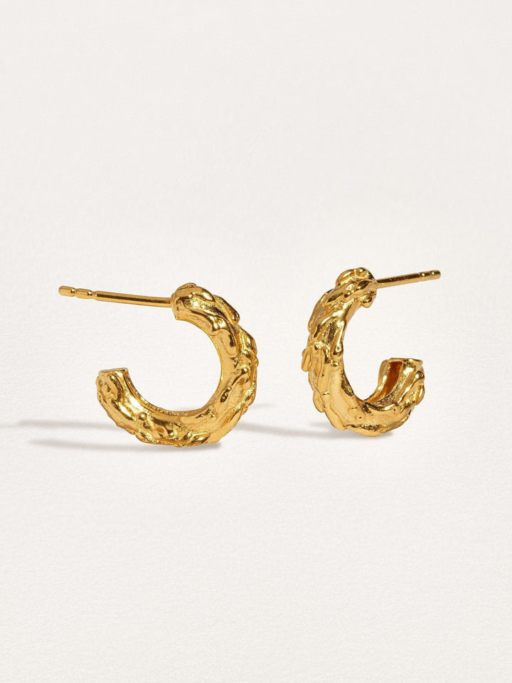 Side view of Groessa Raw Texture Open Hoop Earrings in  gold plated highlighting unique design.