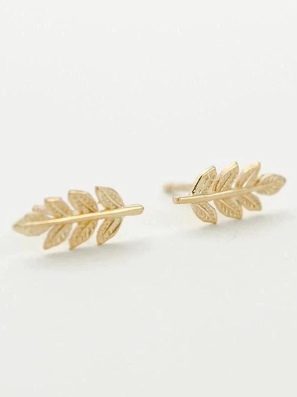 Gudrun stud earrings in 24K gold plated — leaf-shaped silhouette with sculptural detail.