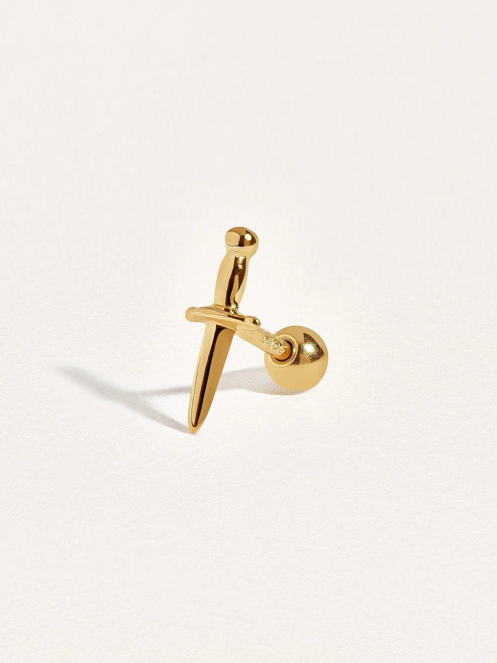 Single gold dagger cartilage stud with ball back, angled view showing secure screw design and delicate shine.