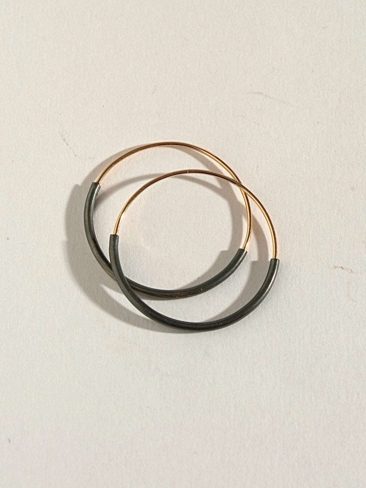 Kim hoop earrings in 14K gold filled — mid and large sizes displayed together.