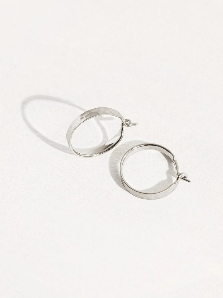 Medium hammered 925 sterling silver matte hoop earrings – chic and versatile design.