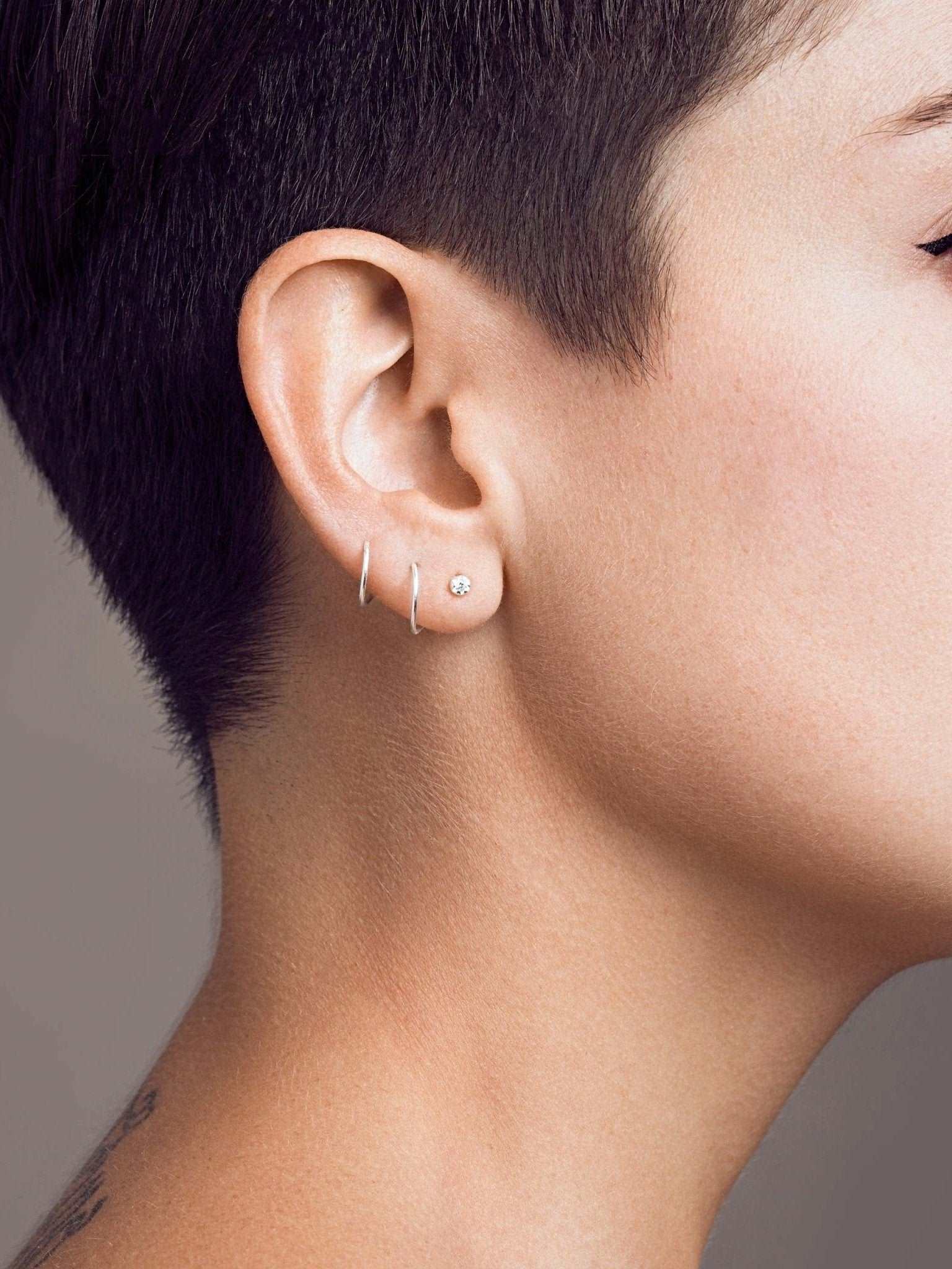 Liria Spiral Earrings - Pair18K Rose Gold Plated• Stone: 2mm White Zircon.BackUpItemsBirthstone EarringsLunai Jewelry