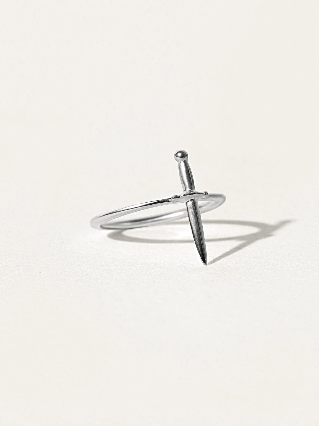 Close-up of Lolita dagger ring in sterling silver with sleek minimalist design.