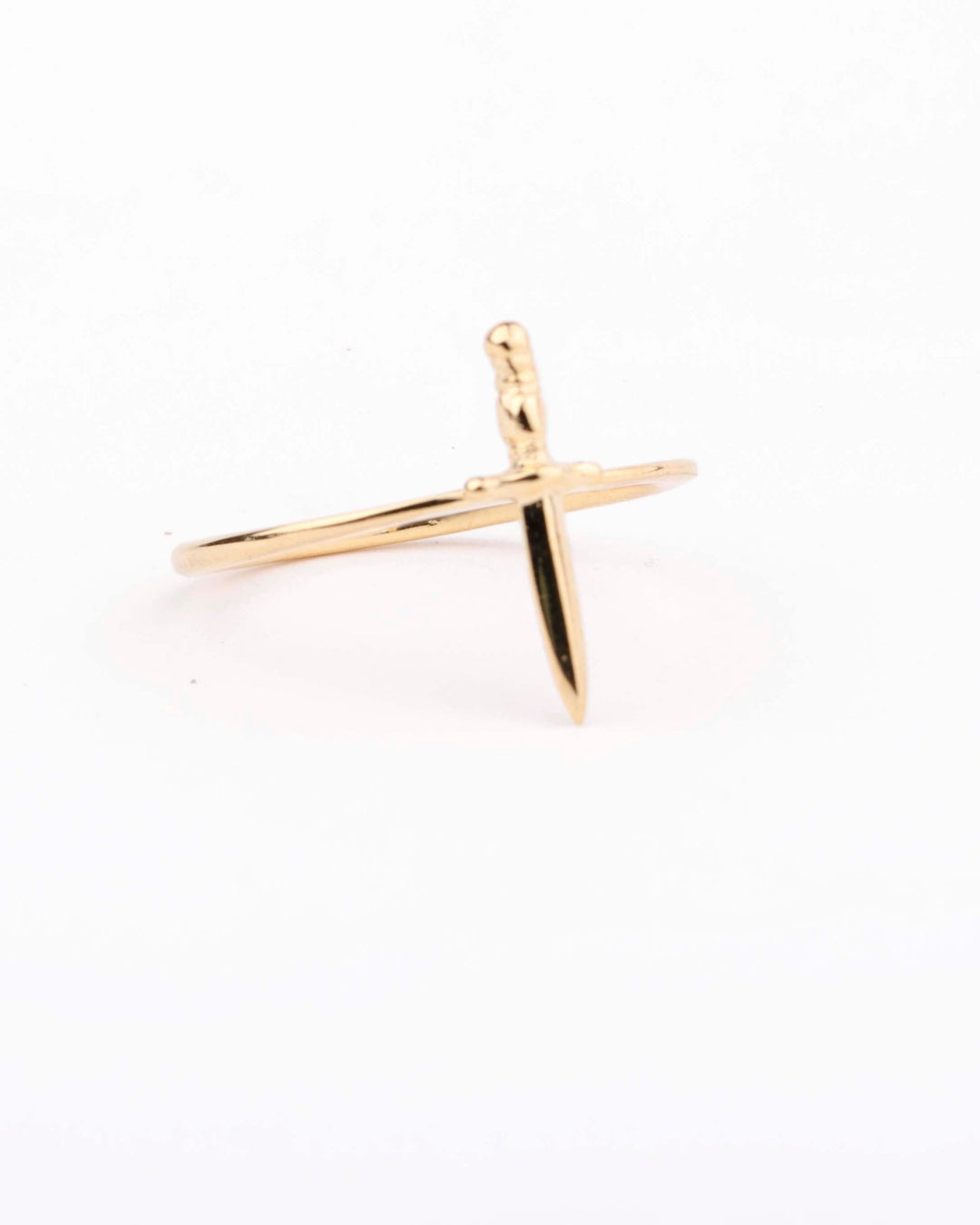 Tiny dagger ring in 24K gold vermeil, photographed on white background.