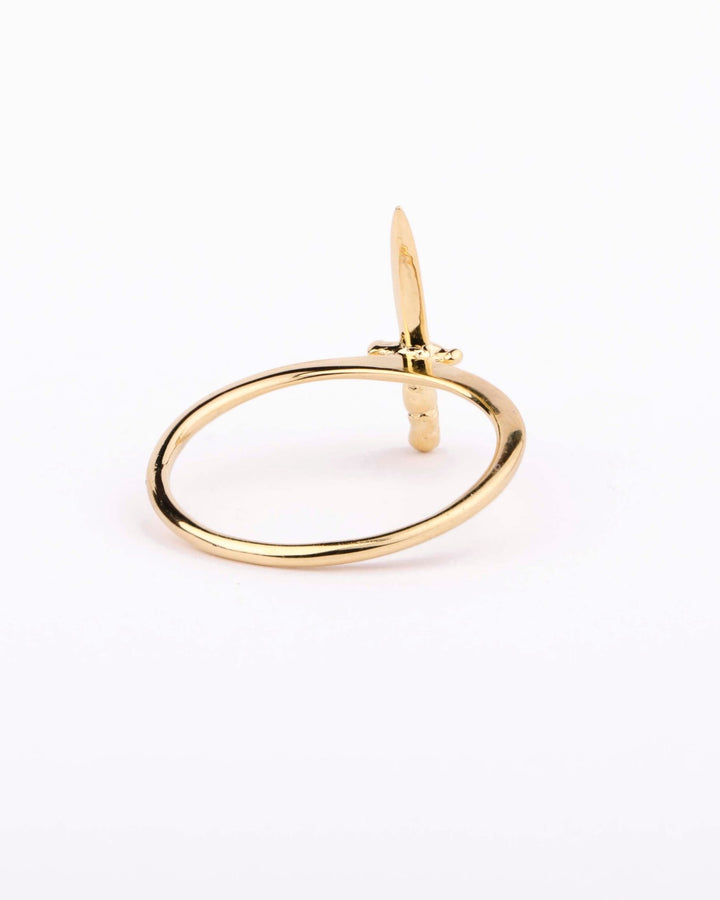 Side angle of gold vermeil dagger ring showing its delicate pointed detail.