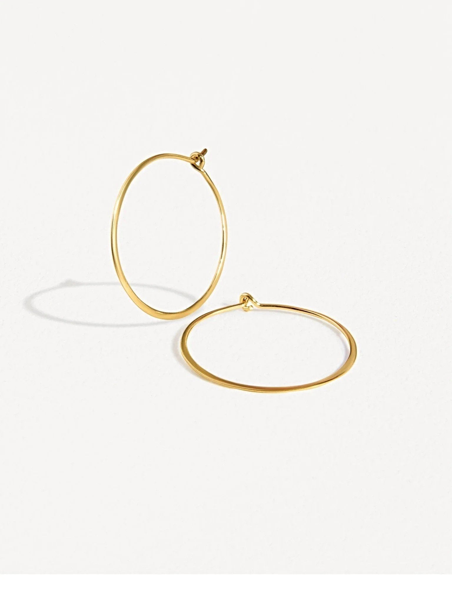 24K gold-plated second-hole hoop earrings β minimalist and delicate design.