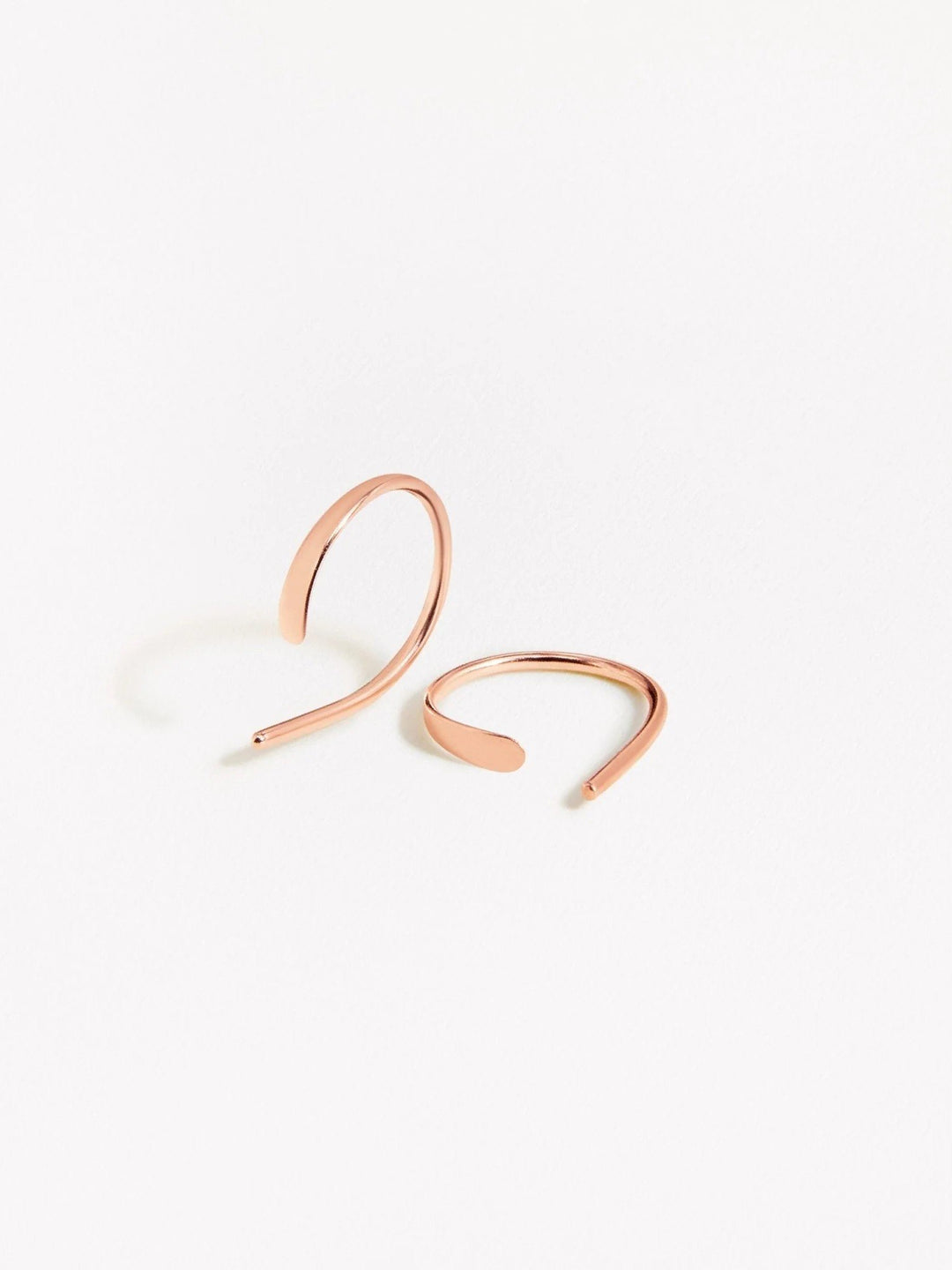 Mixed finish Noe hoop earrings — rose gold and gold versions displayed side by side on white background.