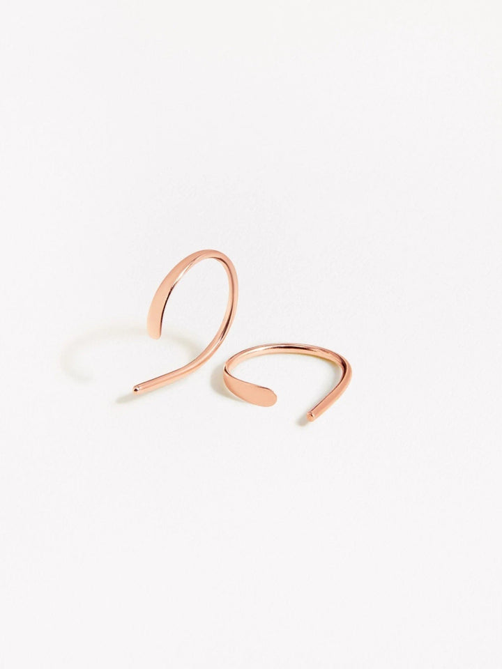 Mixed finish Noe hoop earrings — rose gold and gold versions displayed side by side on white background.