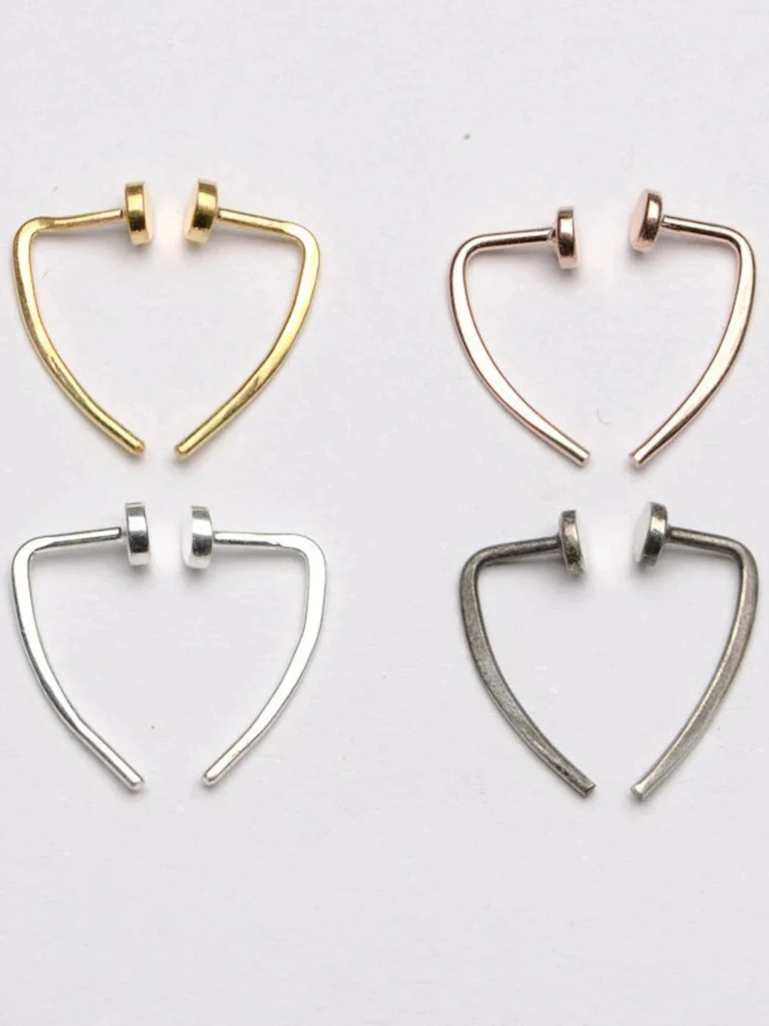Comparison of gold and silver open hoop earrings, modern minimalist style