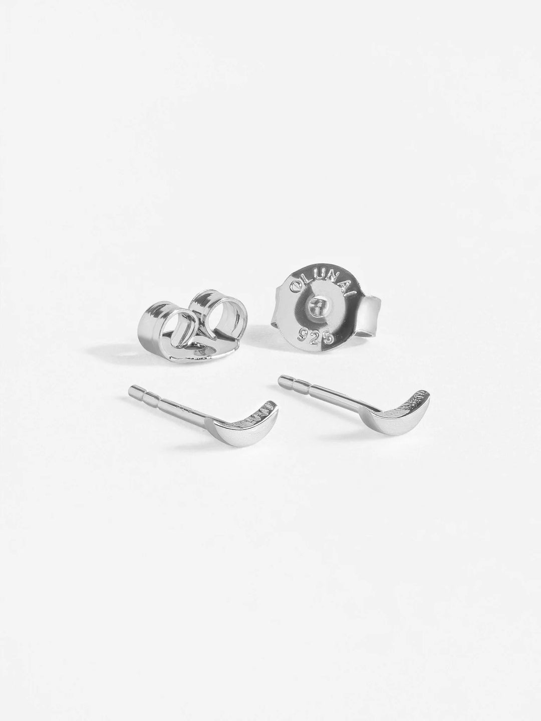 Silver ear jackets and stud earrings with secure backs