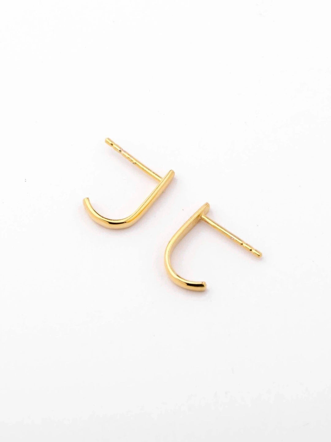 Sita bar earrings in gold plated and sterling silver finishes — sleek design displayed side by side.
