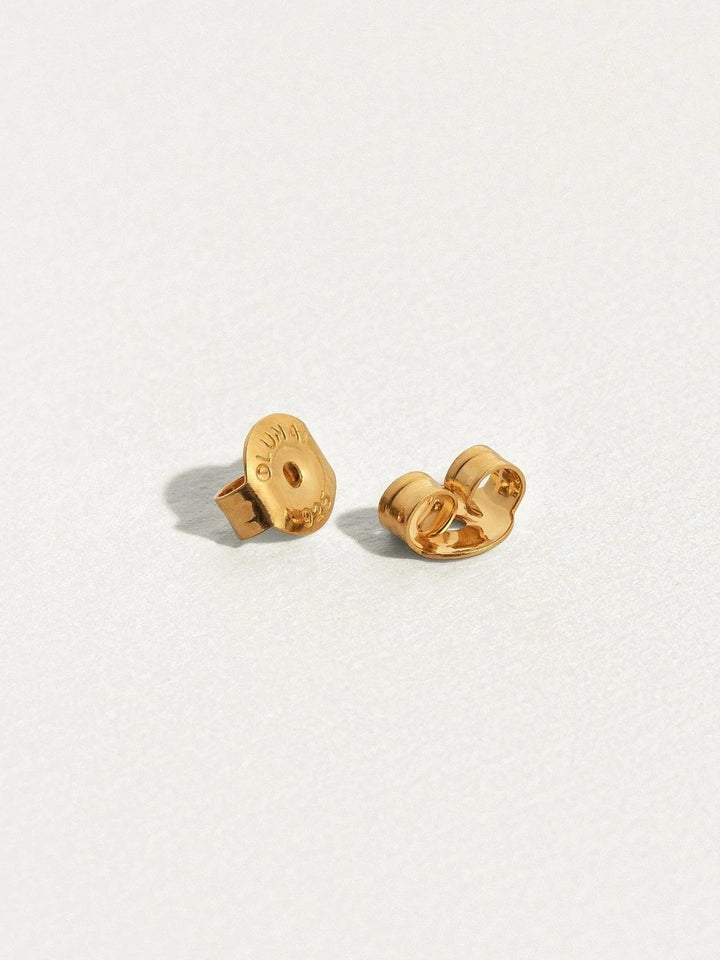 Sita bar earrings in 24K gold plated finish with butterfly backs — minimal design shown flat.
