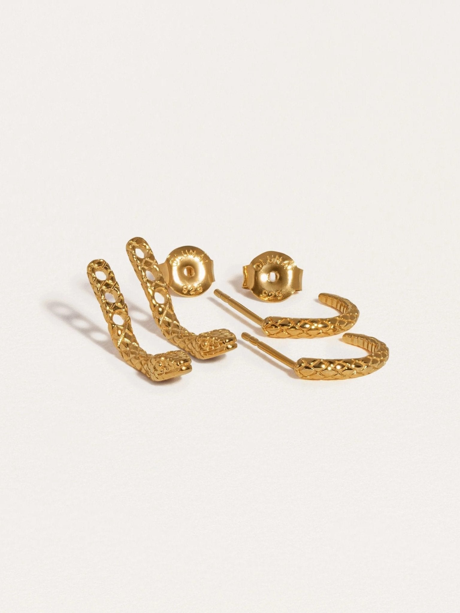 Salma Gold Snake Ear Jackets displayed on a white background, showcasing detailed craftsmanship.