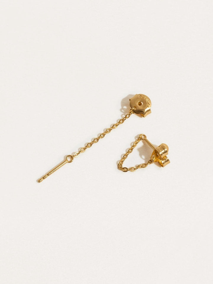 Gold chain stud earrings side view with hanging chain