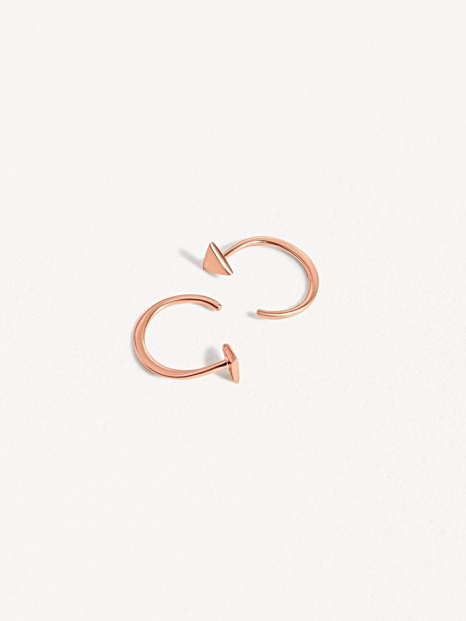 Geometric triangle huggie earrings in rose gold finish