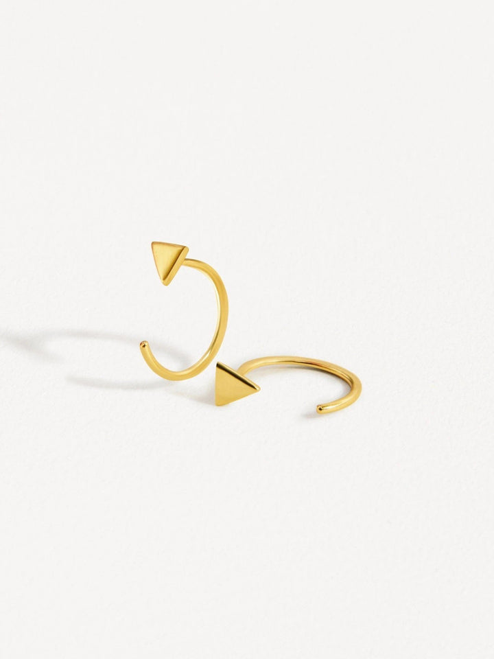 Geometric triangle huggie earrings in yellow gold finish