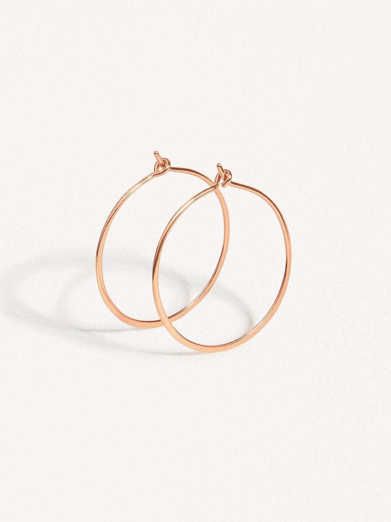 Rose gold-filled second-hole hoop earrings – dainty and minimalist style.