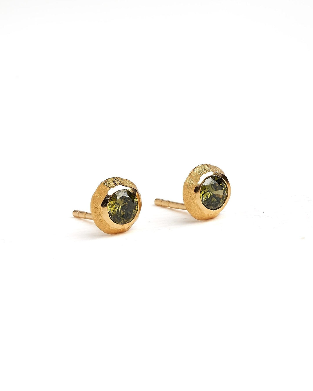 Gold earrings with green stone on a white background, front view – a pair of earrings aligned to show design symmetry.