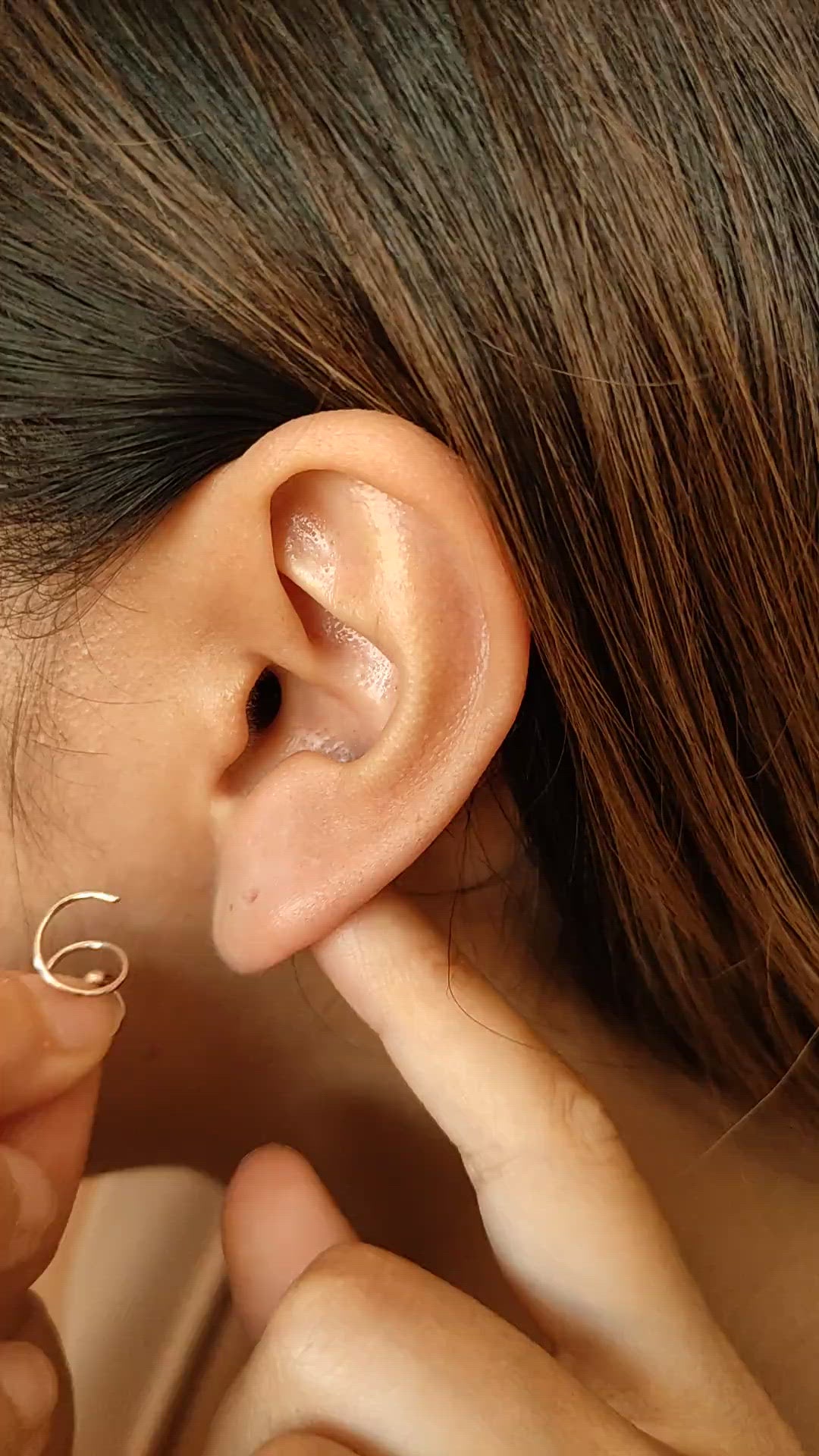 Boucles d'oreilles en spirale Niké