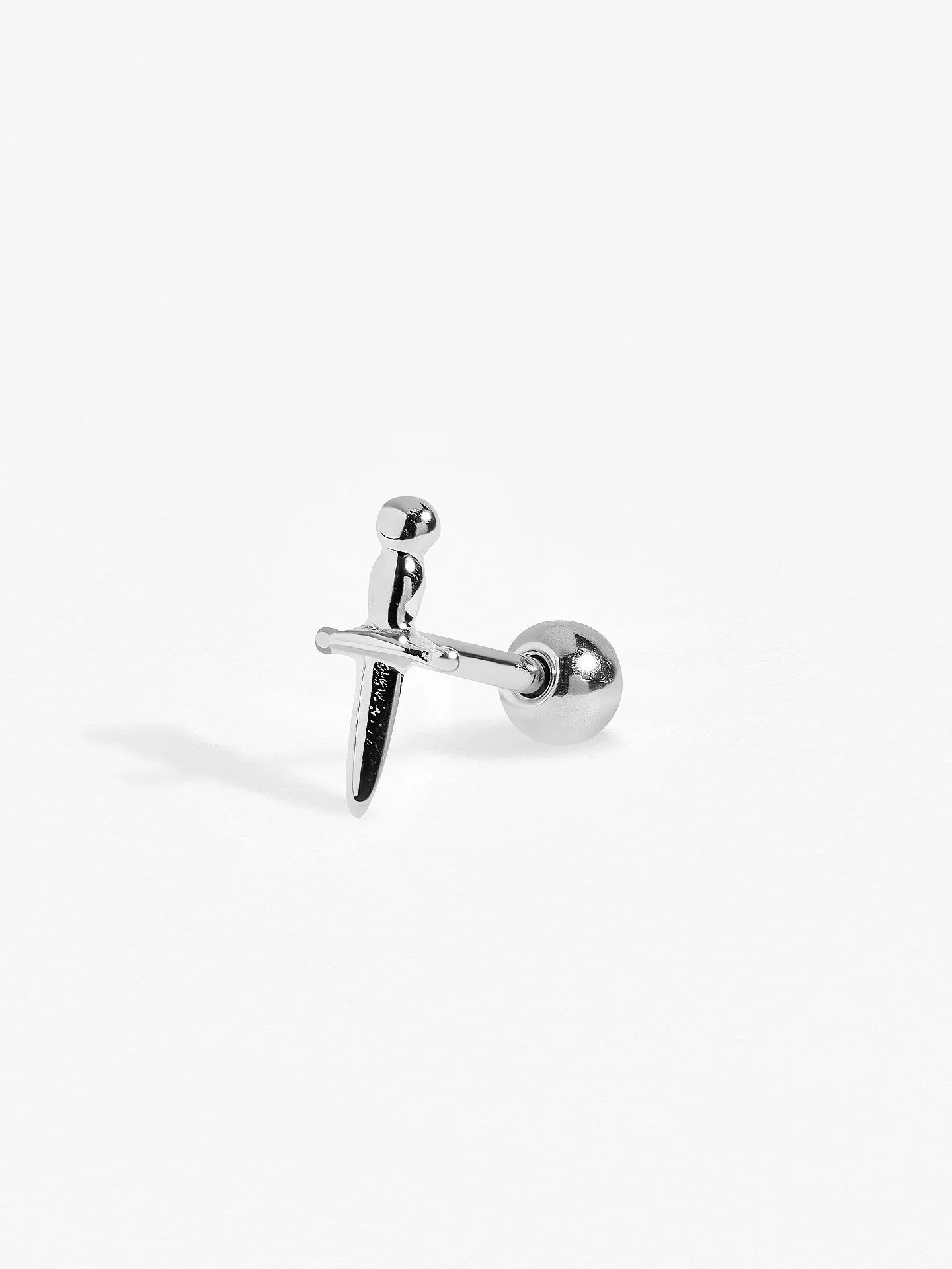 Helix Dagger piercing in oxidized sterling silver with ball back, shown from side angle highlighting dagger detail.
