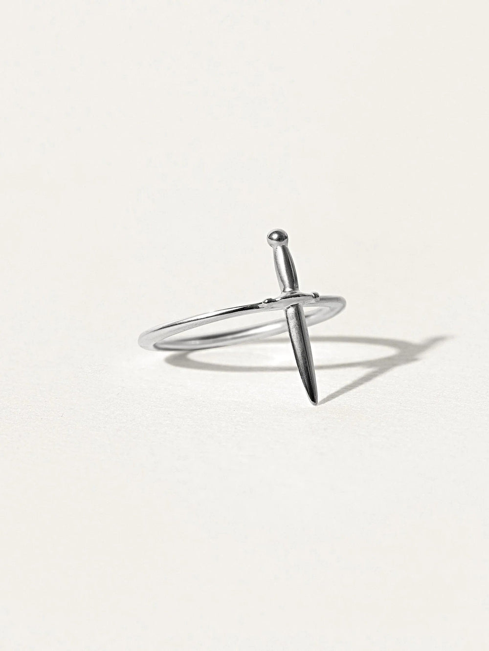 Close-up of Lolita dagger ring in sterling silver with sleek minimalist design.