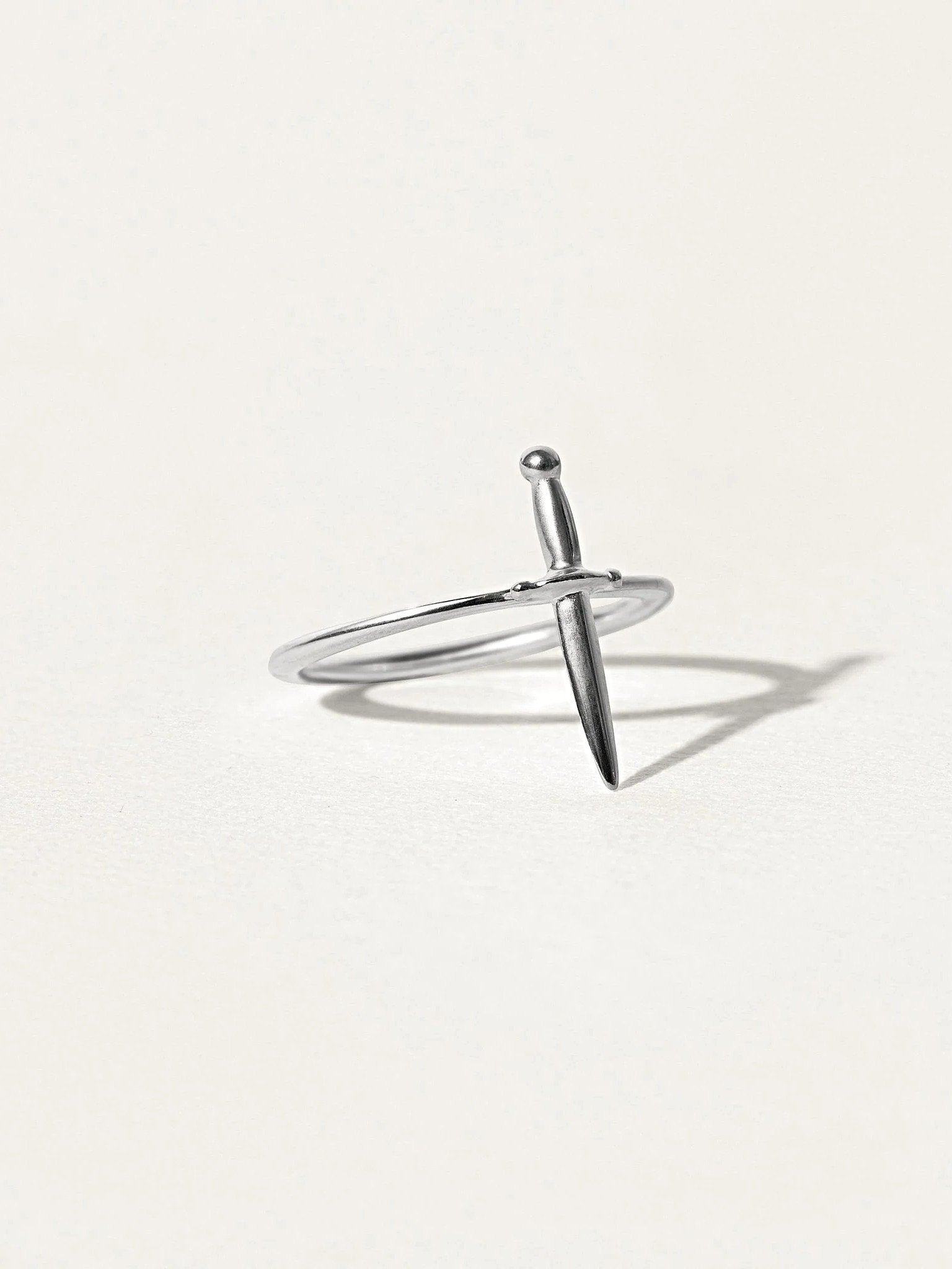 Close-up of Lolita dagger ring in sterling silver with sleek minimalist design.