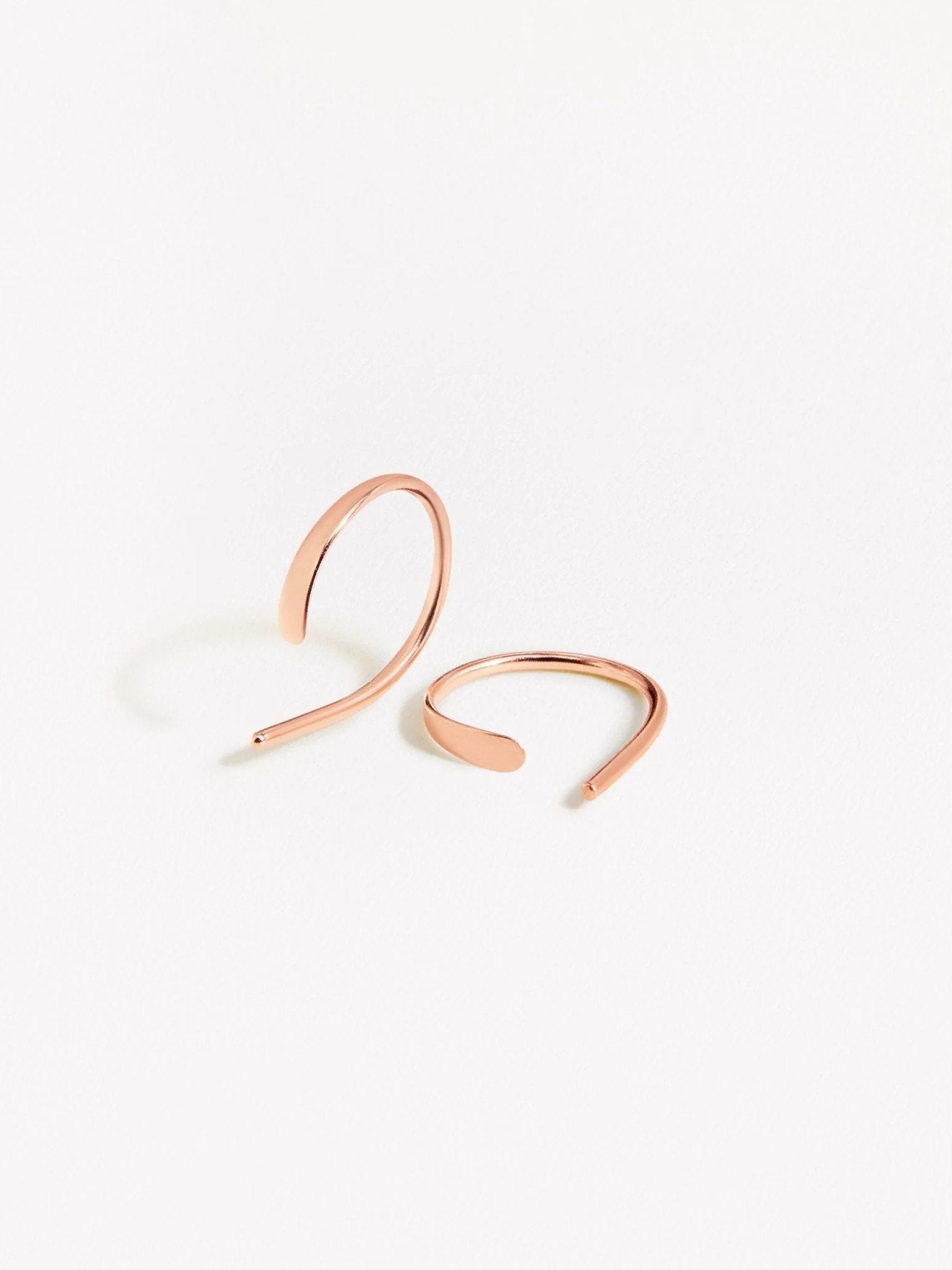 Mixed finish Noe hoop earrings — rose gold and gold versions displayed side by side on white background.