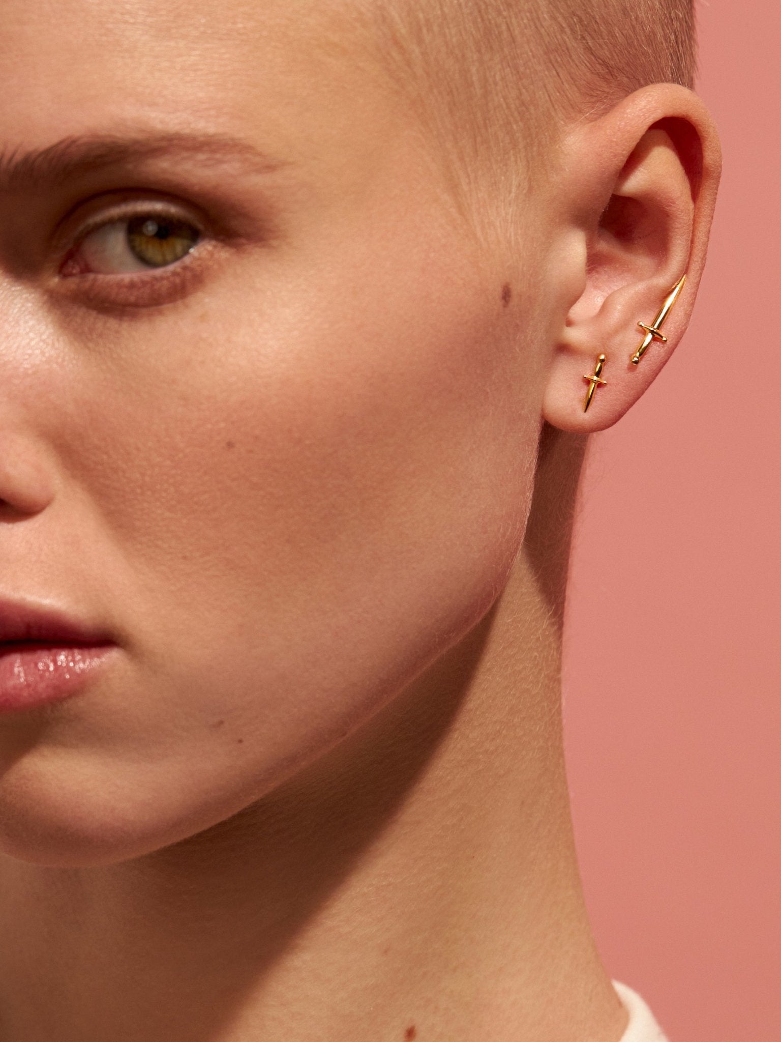 Close-up of model wearing one Tessa Sword Stud Earring – Fashion-forward and minimalist
